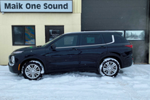 Black 2023 Mitsubishi Outlander with blackout package and window tint